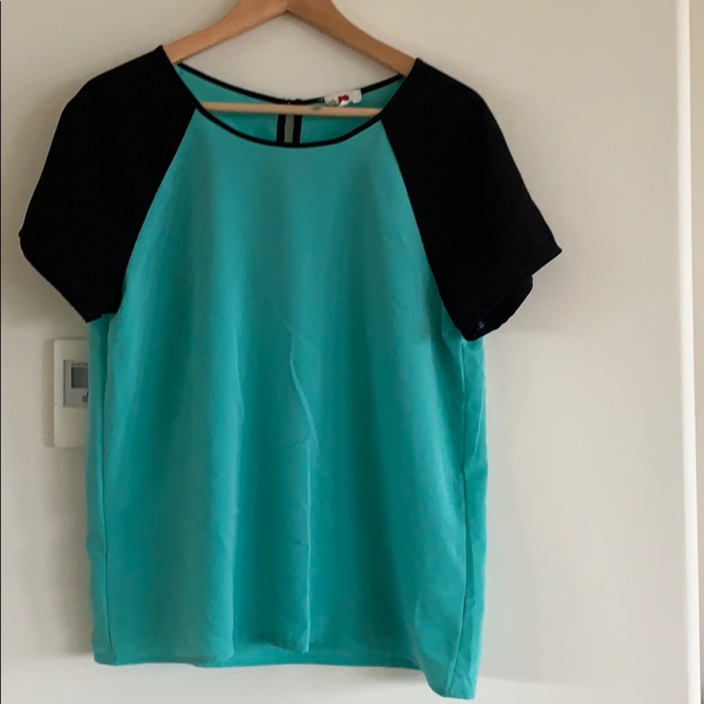 Green and black one clothing blouse, gently worn.